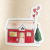 Maison rouge hivernale